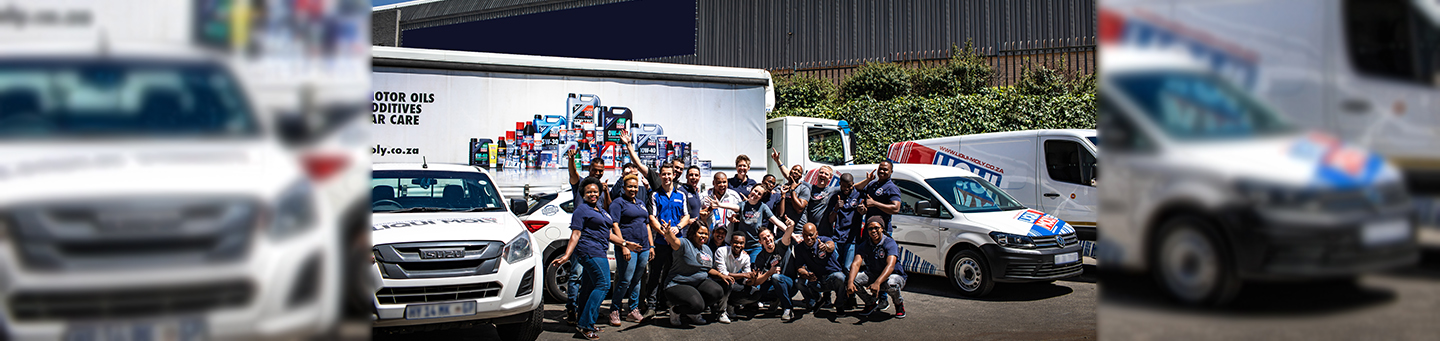 Liqui Moly team together outside place of work