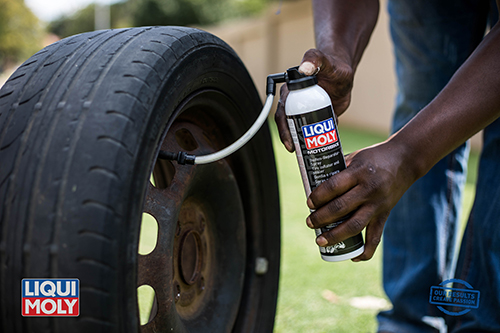 Man DIY car tire